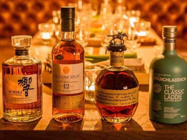A selection of Whiskey on a table in a private booth