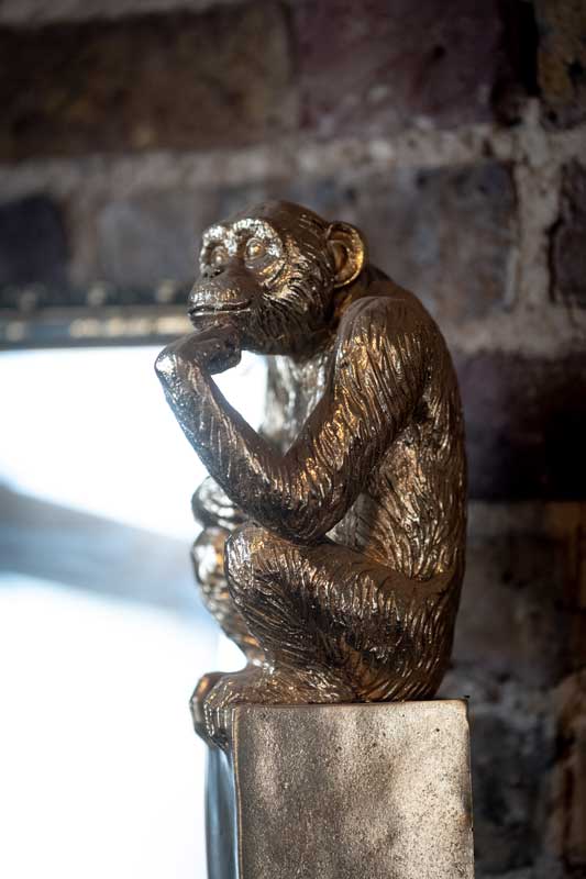 chimpanzee statue in The Monkey Room.